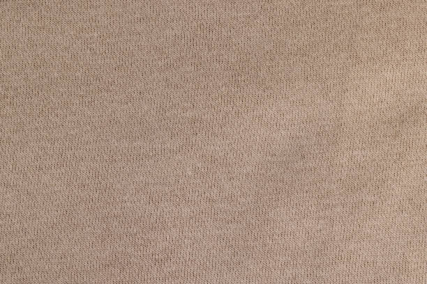 istock beige soft cotton fabric for sewing clothes 2150527900