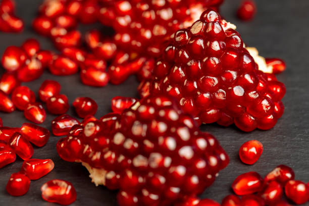 istock red grains of peeled pomegranate fruit 2150528689