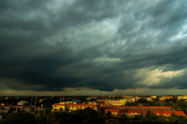istock Dramatic dark storm rain clouds black sky background. Dark thunderstorm clouds rainny atmosphere. Meteorology danger windstorm disasters climate. Dark cloudscape storm disaster gloomy gray cloud sky 2150529858
