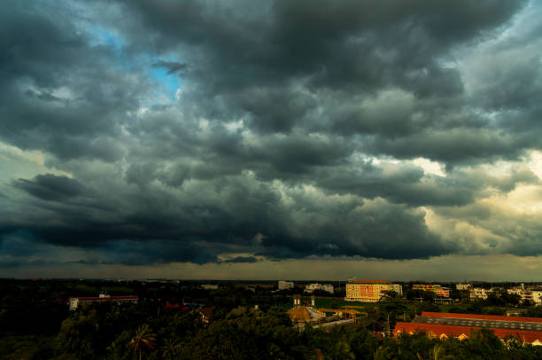istock Dramatic dark storm rain clouds black sky background. Dark thunderstorm clouds rainny atmosphere. Meteorology danger windstorm disasters climate. Dark cloudscape storm disaster gloomy gray cloud sky 2150529860