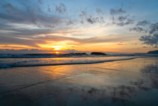 istock Landscape with seashore and dramatic sky during summer sunset as wallpaper 2150530599
