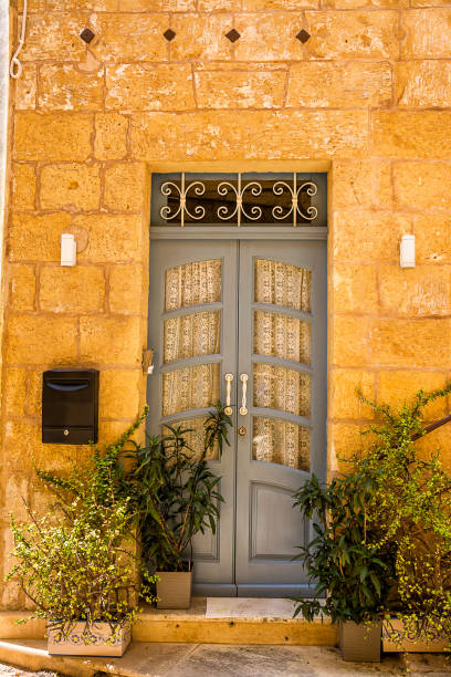 The Typical grey door in Maltese villages