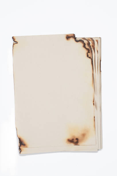 istock Burnt vintage paper sheets on a white background. 2150532523