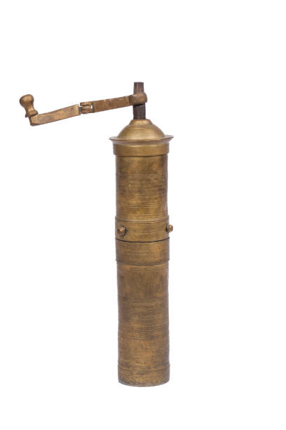 istock Middle Eastern Gilded Brass Pepper Mill with Ornate Engraving - Culinary Tradition on White Background 2150535124