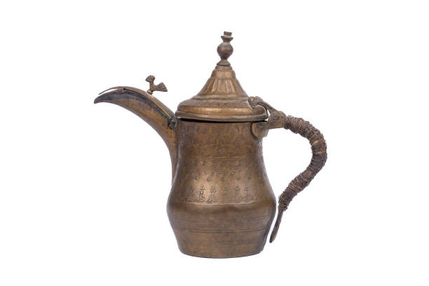 istock Vintage Arabic Dallah Brass Coffee Pot on White Background - Middle Eastern Bedouin Tea Tradition 2150535127