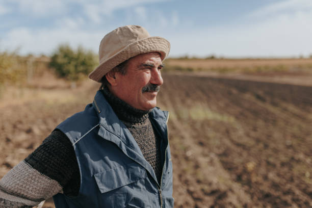 istock Aged Grace Senior Farmer's Timeless Portrait in the Fields 2150537020