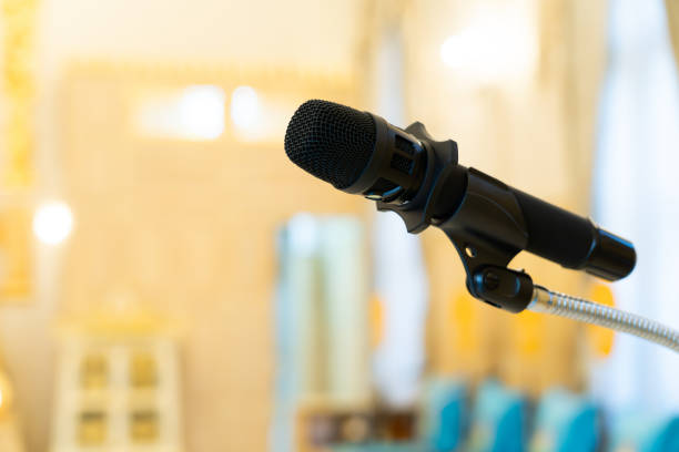 istock Close-up shot of microphone on bokeh light background 2150537491