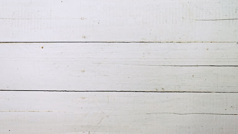 Old white weathered grunge wood plank background.