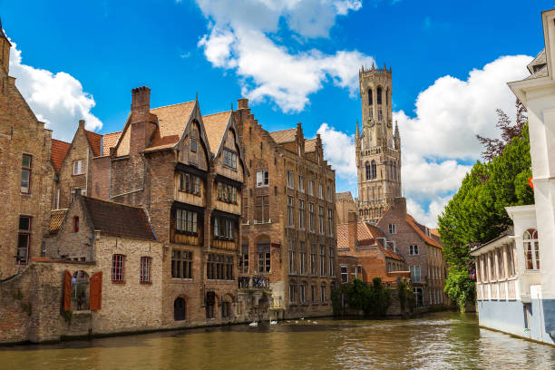 istock View at Canal in Bruges and Belfry tower 2150541539