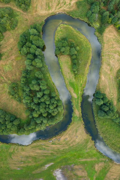 istock beautiful landscape with a small meandering river (aerial view) 2150542251