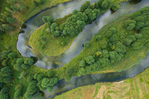 istock beautiful landscape with a small meandering river (aerial view) 2150542285