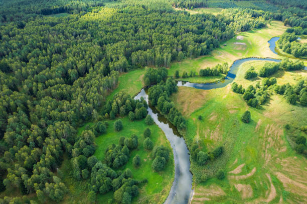 istock beautiful landscape with a small meandering river (aerial view) 2150542330