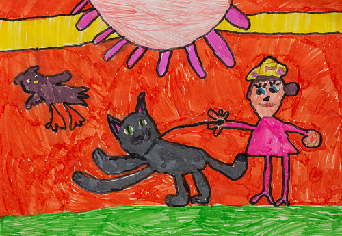 Child picture of child with cat and flying bird