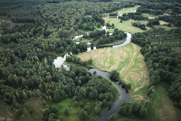 istock beautiful landscape with a small meandering river (aerial view) 2150544761
