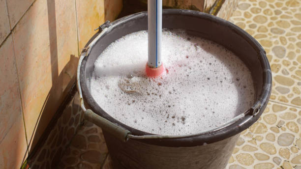 istock A mop and a bucket of soapy water. 2150545298