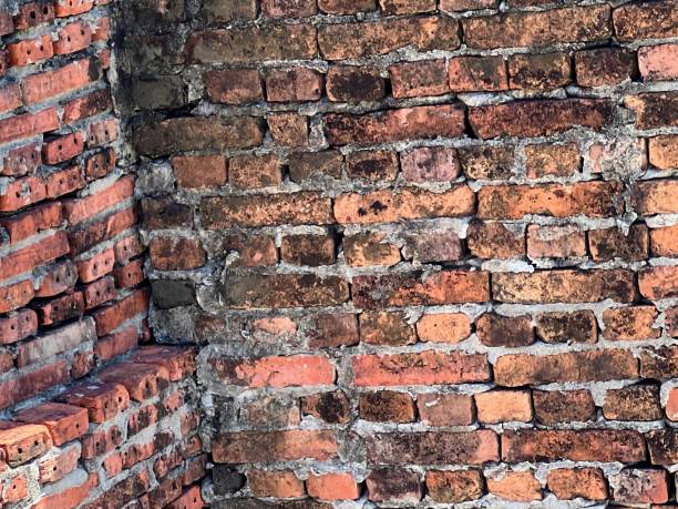 istock a photography of a brick wall with a red brick corner. 2150548803