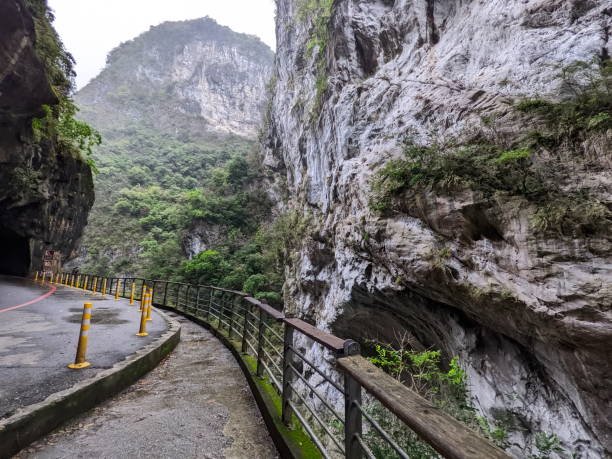 istock An empty and open section on Swallow Grotto Trail alongside swallow hollows and potholes on marble cliffs on a rainy day before 403 earthquake during the pandemic 2150549698