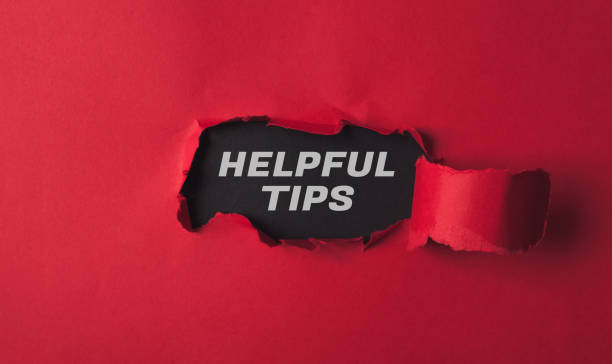 istock A red background with a black word that says helpful tips written in white 2150553668