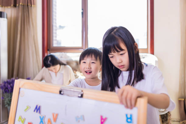 istock Mother and children play games 2150553739