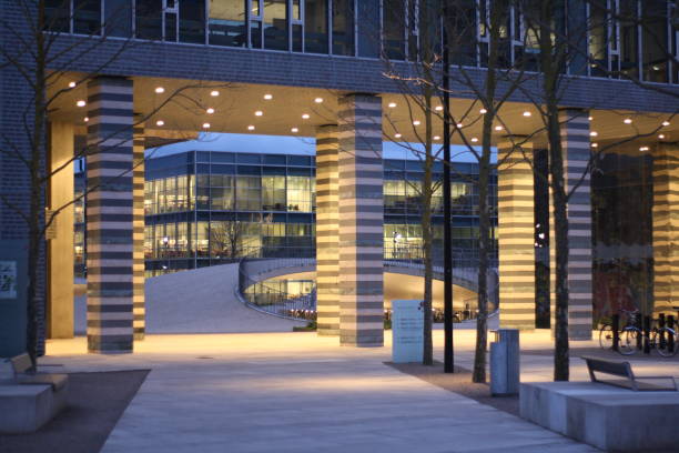istock Contemporary city district at dusk illuminated by light 2150554416