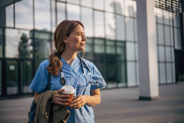 istock A beautiful female doctor on a coffee break. 2150554794
