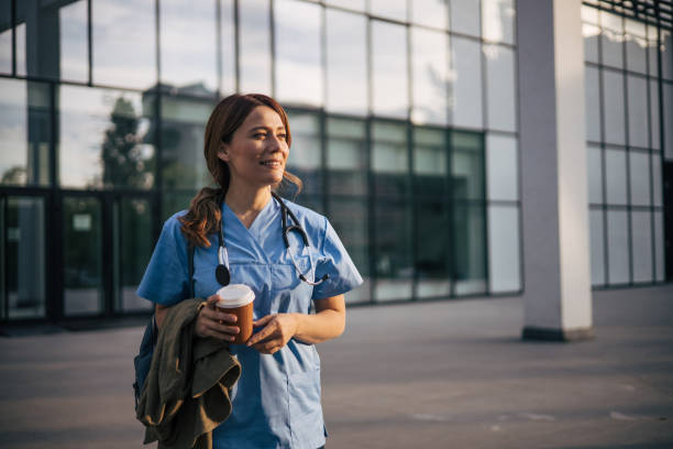 istock A beautiful female doctor on a coffee break. 2150555395