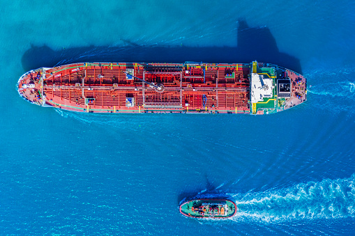 Aerial view of Oil ship tanker transportation crude oil from refinery on the Marmara Sea. Passing under Yavuz Sultan Selim Bridge.