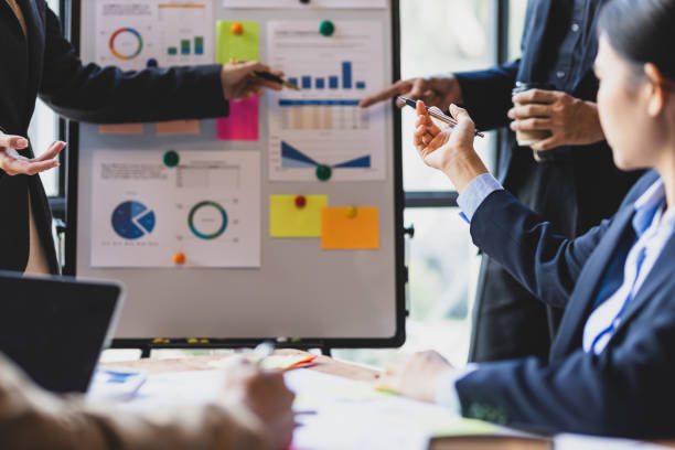 istock Business meetings, brainstorming presentations and discussions exchange ideas with colleagues in the organization. Investment strategy analysis and business planning. 2150555606