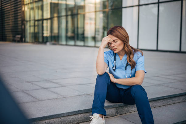 istock The female doctor looked tired. 2150556529