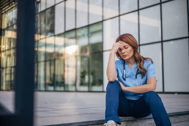 istock The female doctor looked tired. 2150556569