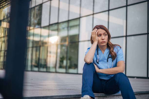 istock The female doctor looked tired. 2150556570