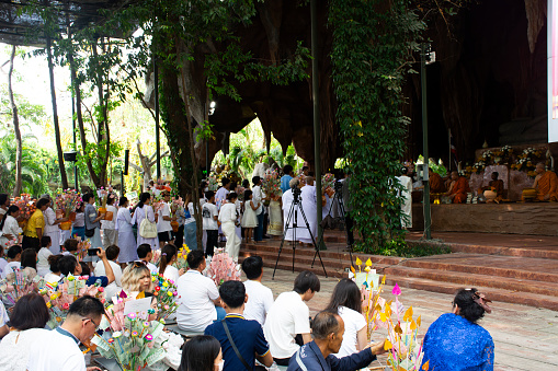 Thai practitioner meditation retreat observe religious precepts and donate offering robes to Buddhist priests monastery Kathin ceremony at Wat Maheyong temple on April 7, 2024 in Ayutthaya, Thailand