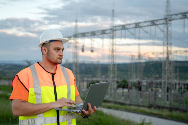 istock Male engineer with a safety helmet working at a power station 2150561240