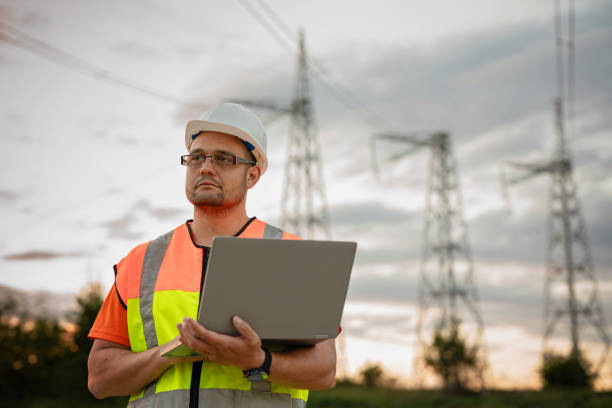 istock Male engineer with a safety helmet working at a power station 2150561252