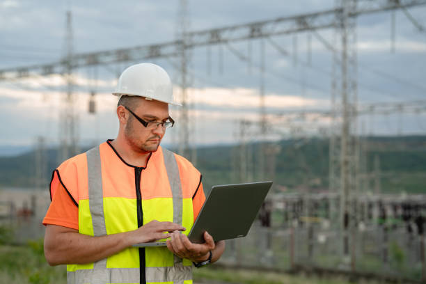istock Male engineer with a safety helmet working at a power station 2150561255