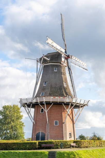 istock dutch windmill in the country 2150561504
