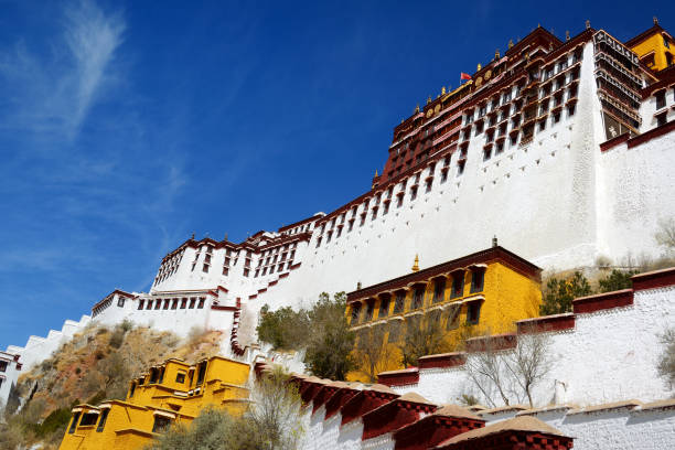 The Potala Palace in Lhasa set against Himalayan mountains. TibetThe historic residence of the Dalai Lama of Tibet, constructed from 1645 - now a museum that dominates the skyline of Lhasa