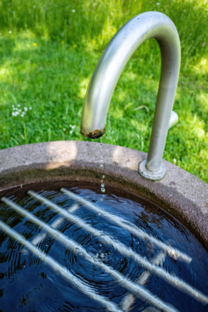 istock fountain with outdoor water crane 2150561683