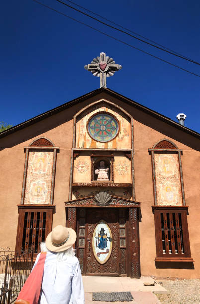 Chimayo, NM: Tourist Entering Santo Nino Chapel