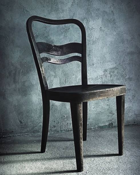 istock Old vintage chair on grey background 2150563811