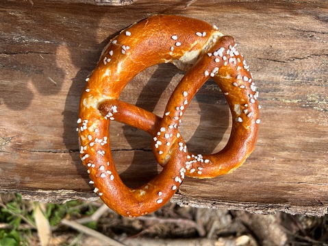 View of a soft pretzel with shadow isolated on white. Includes clipping path.