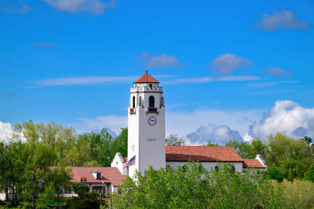 istock Train Depot on a spring day with blue sky and clouds 2150569193