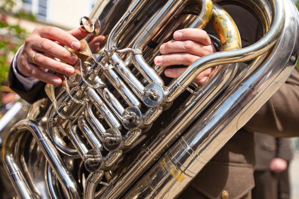 istock Closeup of hands playing tuba 2150571072