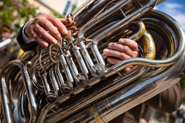 istock Closeup of hands playing tuba 2150571089