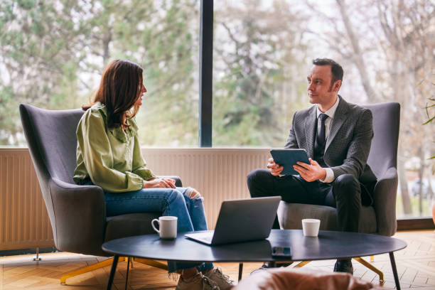 istock Businessman interviewing with a woman. 2150574196