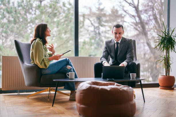 Businessman interviewing with a woman.