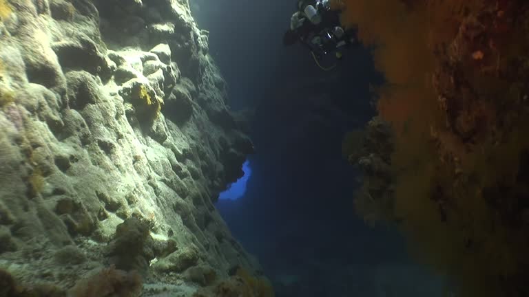 Underwater cave invites you to explore its hidden wonders of Red Sea.