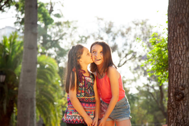 Little sisters playing and having fun ourdoors