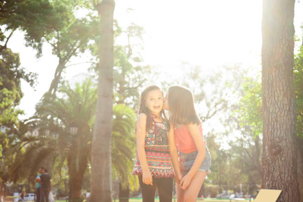 Little sisters playing and having fun ourdoors
