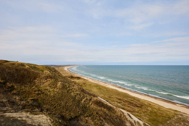 istock Beautiful view of seascape and landscape against cloudy sky 2150580077